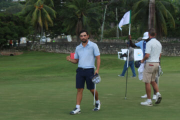 Andrew Arft celebrates winning the Jamaica Open title after a birdie on the 18th