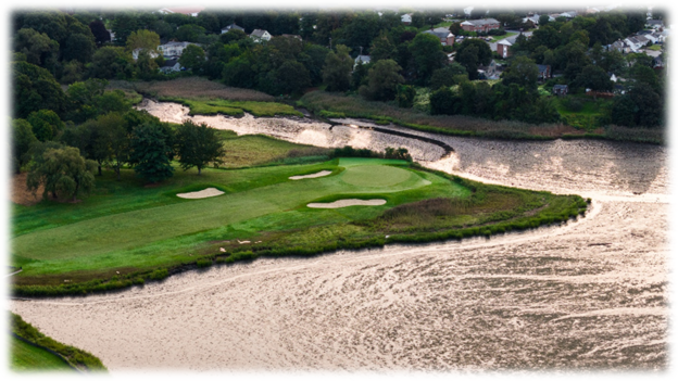 An aerial view of the second hole at Met Links, highlighting the renovated features and scenic backdrop.